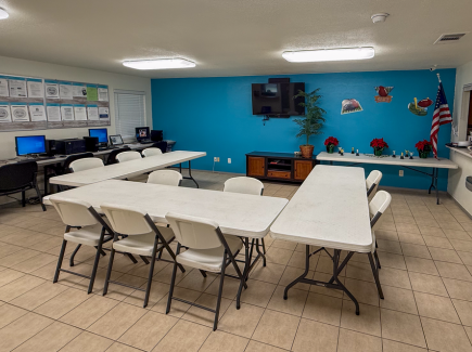 Community room with computers at Pathways at Coronado Hills property
