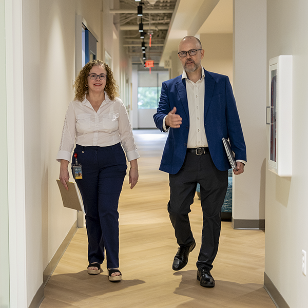 Photo of AHA employees walking down a hallway