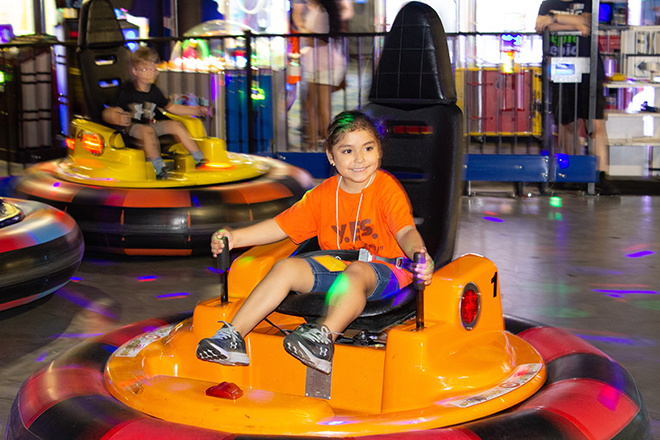 Photo of child on festival ride.