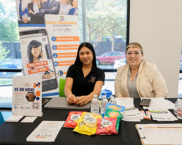 Photo of AHA employees working a recruiting event